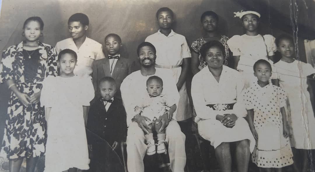 Pa Ndambi with members of his family in a group portrait